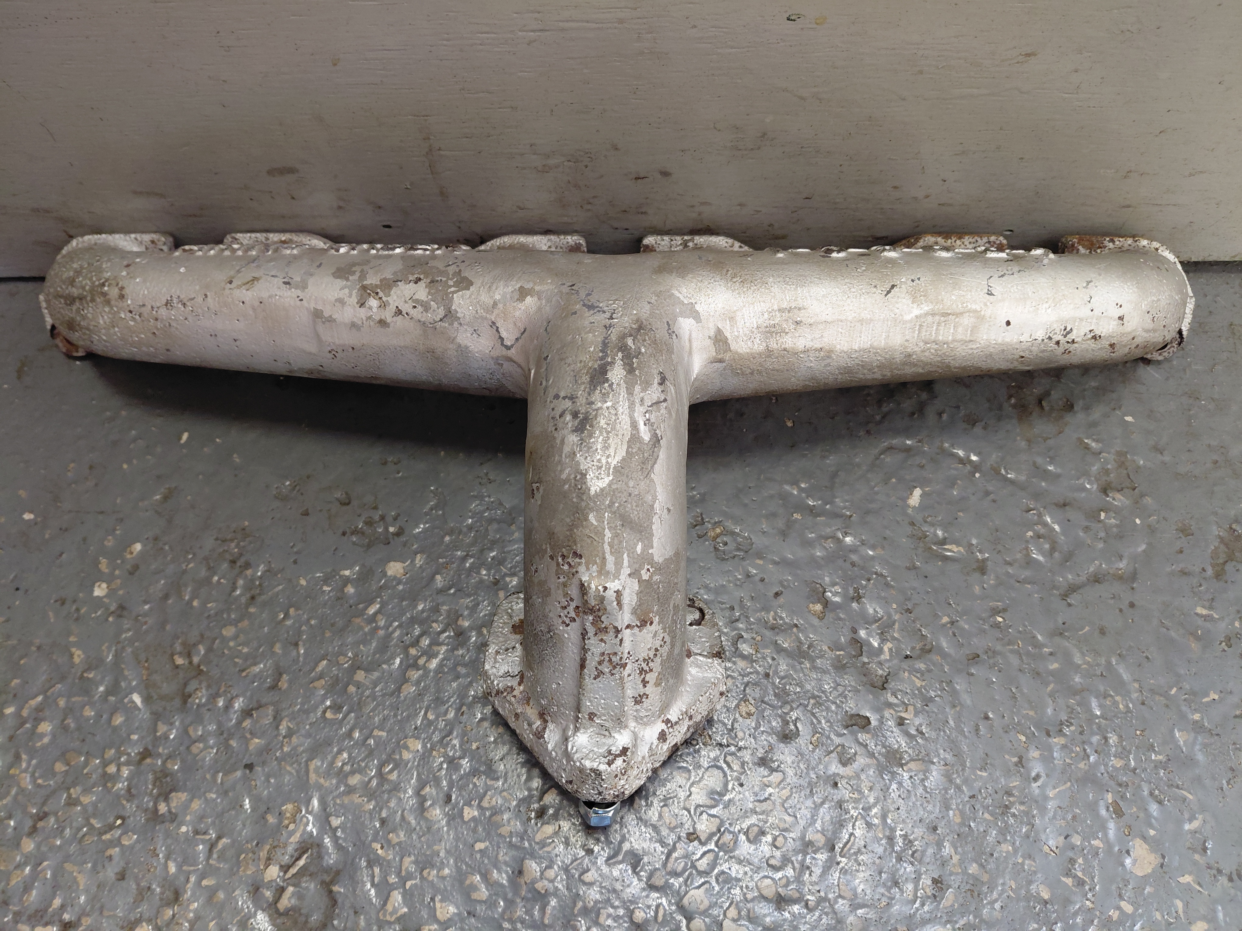 Exhaust Manifold 95/100 (will also fit 75/90) USED ONLY Good studs and skimmed on the mounting surface